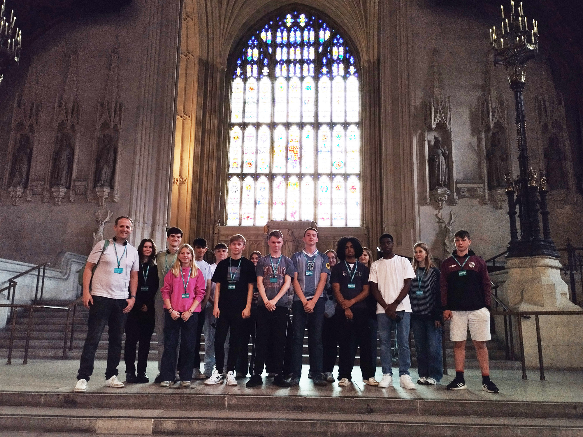 Students pose for a photo in the House of Parliament during a trip to London