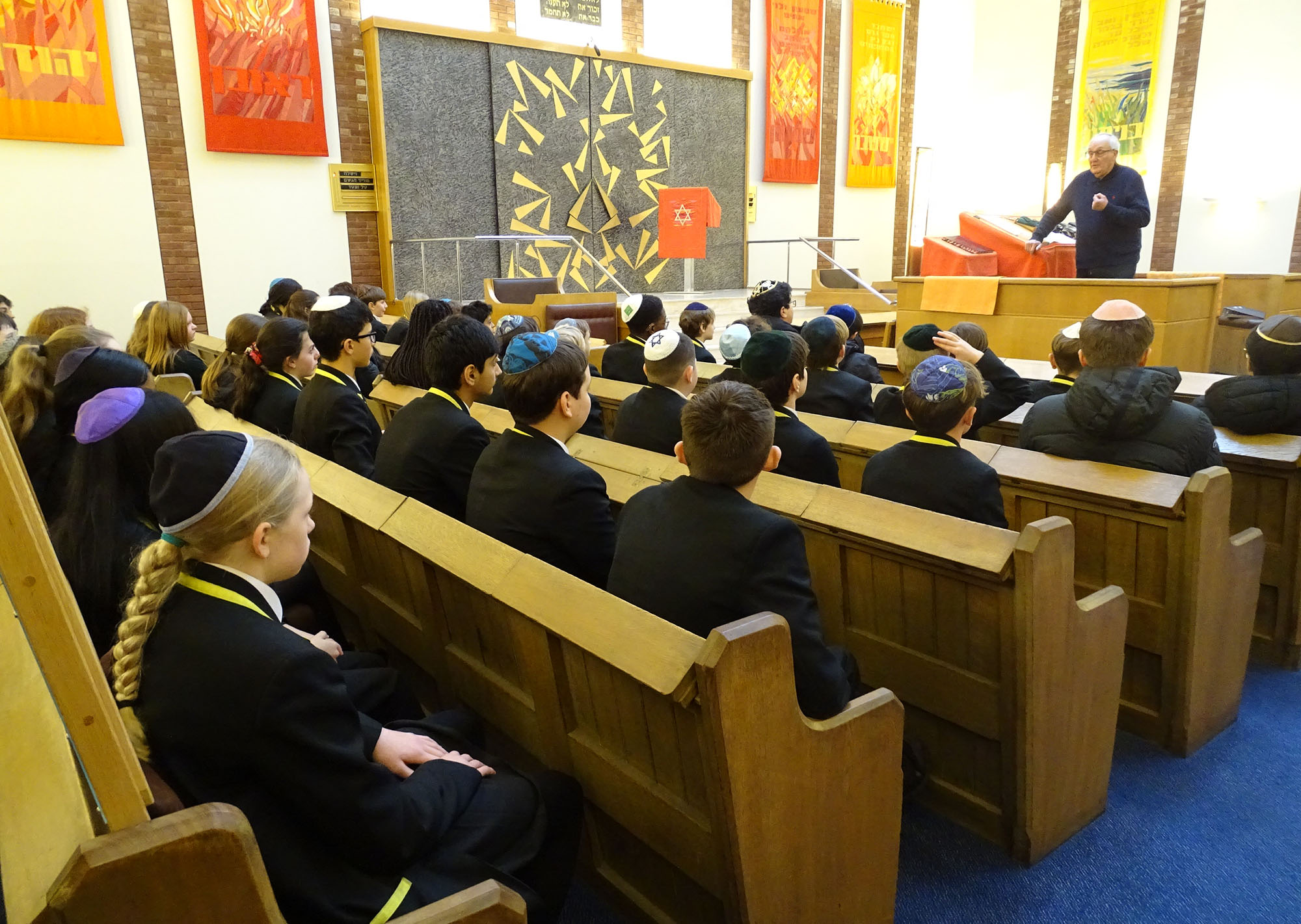 Second Years listening to a talk at Gatley Synagogue about the Jewish faith
