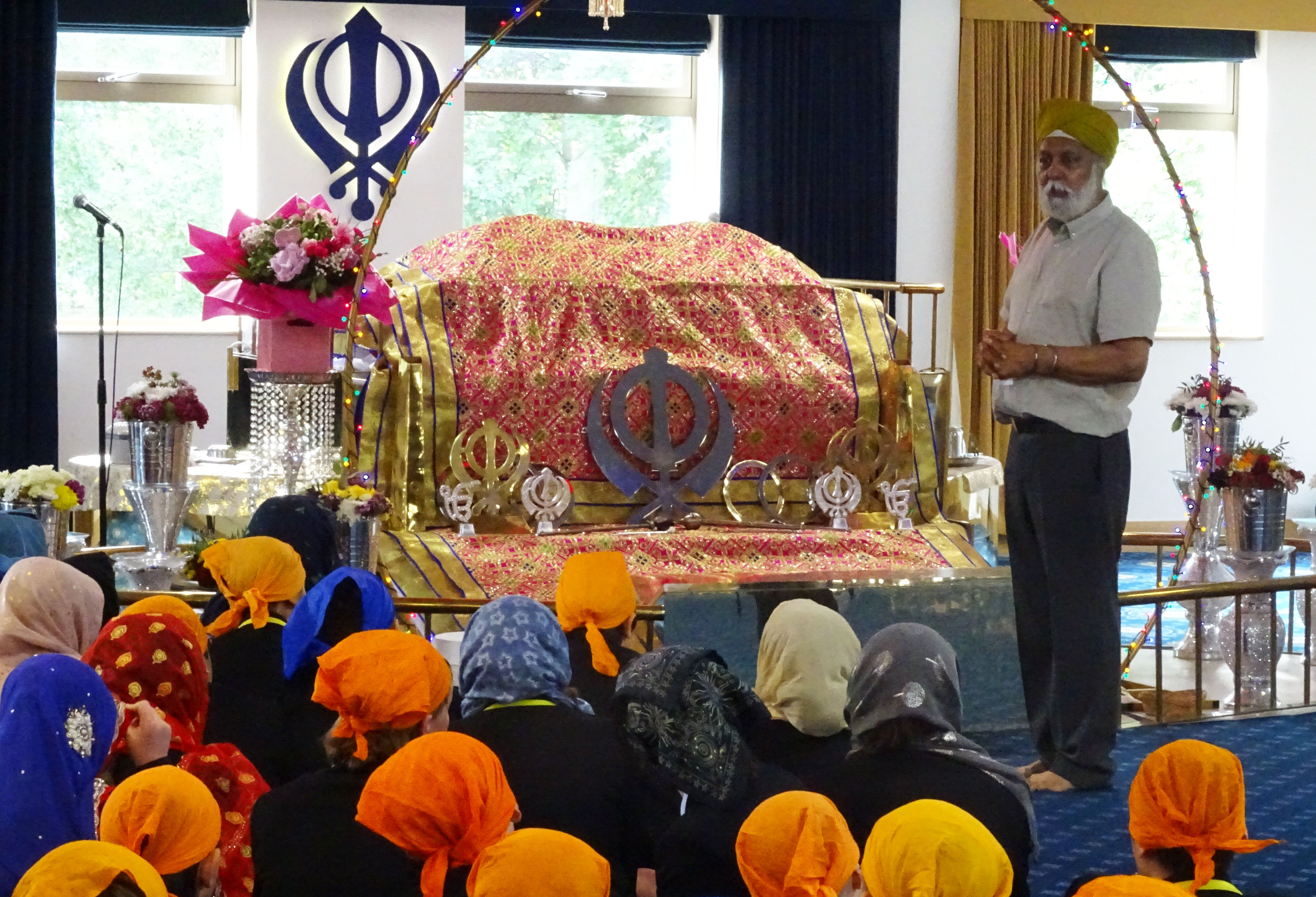 First Year pupils listening to a talk at the Sri Guru Gobind Singh Gurdwara Educational and Cultural Centre