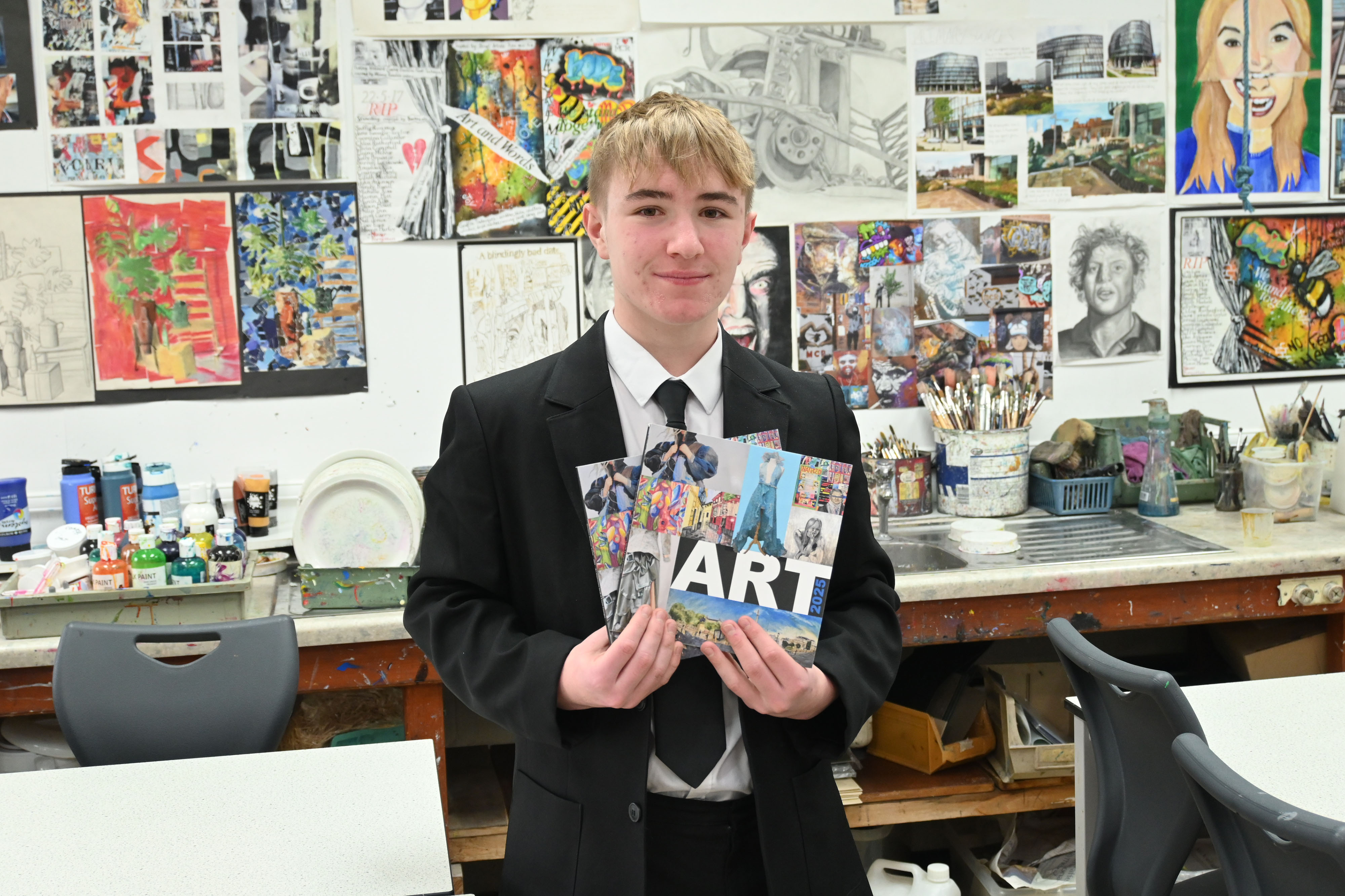 Pupil with the 2025 GCSE and A Level Art catalogue