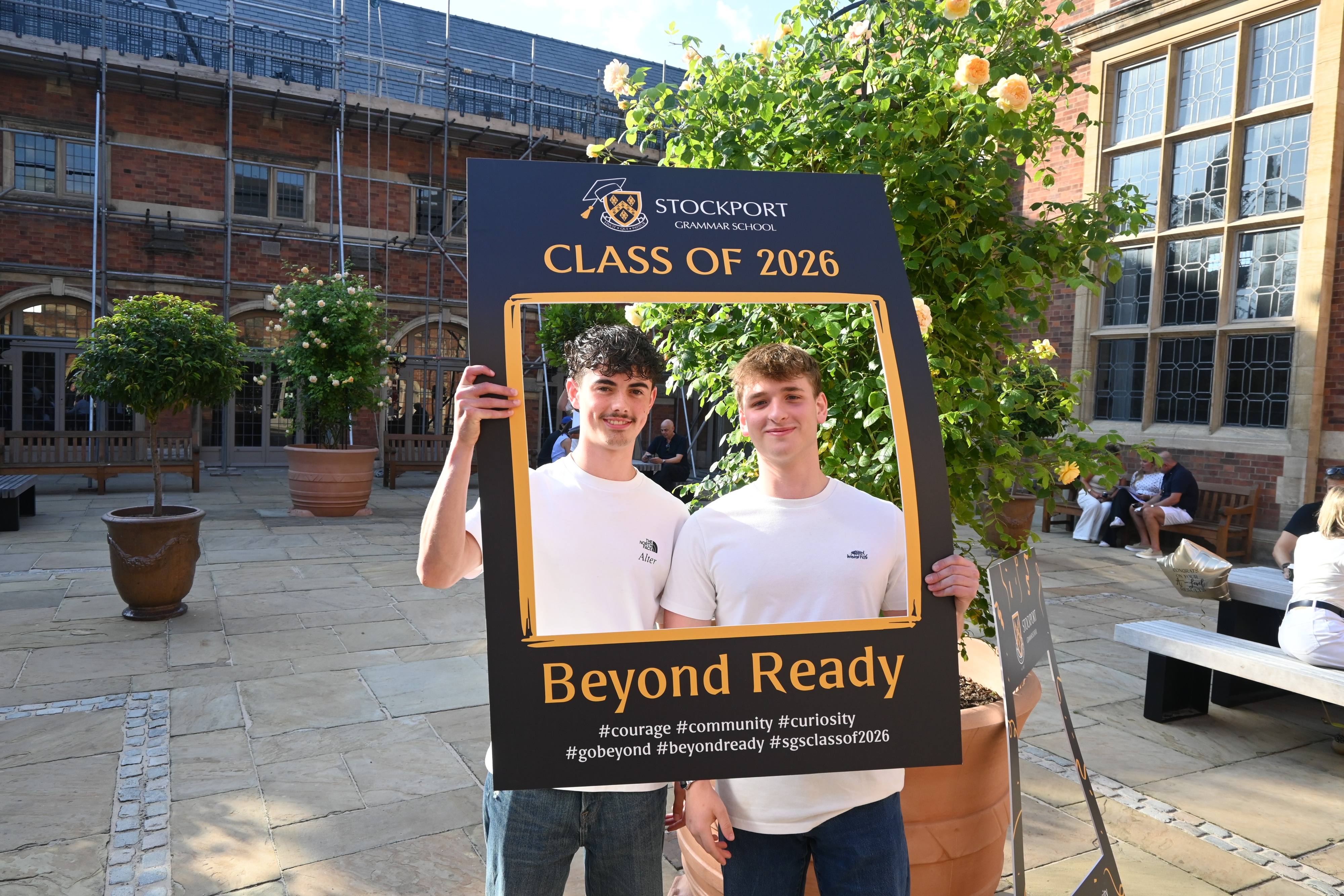 Pupils holding a Class of 2026 board after receiving their A Level results